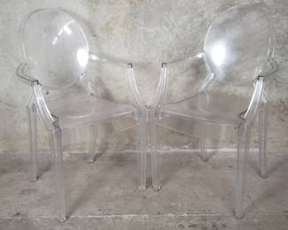 096 Lot 58 Pair of Kartellstyle acrylic stackable arm chairs