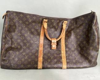 028 Lot 604 Vintage Louis Vuitton French Company Sac Souple travel bag