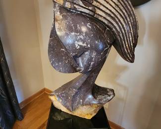 Solid Shona Stone Zimbabwean lady renowned Sculptor Lovemore Bonjisi.