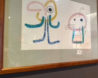 Lot 10: Joan Miro - Abstract framed print with whimsical figures (37/120)