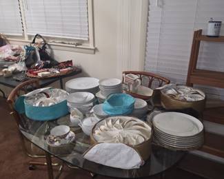 "Estate sale vintage china collection with floral teacups, saucers, decorative plates, and porcelain dinnerware. Keywords: vintage china, porcelain, teacups, saucers, dinnerware, tea sets, collectibles, estate sale.