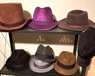 Hat on top left is giving The Strand vibes, cool purple may be just what you need to compliment your Halloween costume