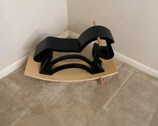 Modern rocking horse, perfect aesthetic for crisp minimalist, modern decor