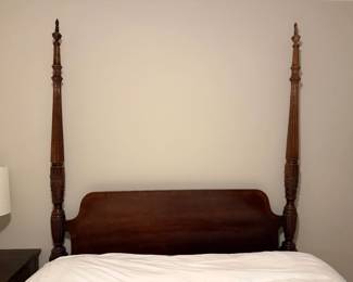 Queen-size impressive high-post Colonial Revival Rice bedframe carved from rich mahogany. From Marshall Fields. Includes canopy rails.