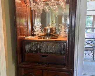 Custom-made cherry wood lighted bar cabinet!
