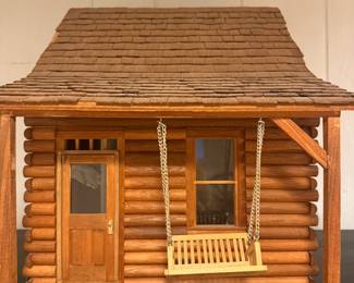 Hand-made log cabin doll house from Leslie Hindman Auctioneers