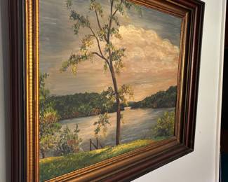 Framed lakeside tree landscape painting in dark wood frame