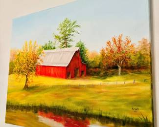 Unframed oil-style canvas of red barn and pond landscape