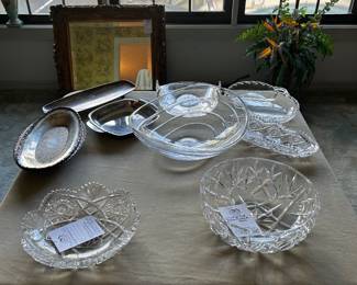 Table of cut crystal bowls, trays and serving pieces