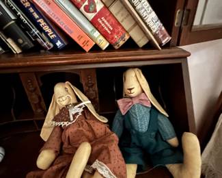 Secretary bookcase with books and fabric bunny dolls