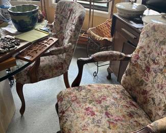 Floral upholstered armchairs with writing desk and brass