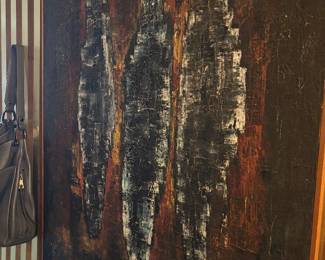 Large textured abstract painting in earth and gold tones