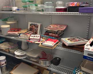 Pantry shelving with containers, cookbooks and supplies