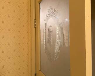 large frosted glass panel displays a detailed portrait of President McKinley surrounded by an elaborate Victorian-style floral and scrollwork design. Back panel