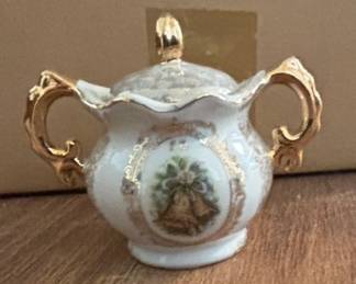 Miniature Porcelain Sugar Bowl with Bell Motif