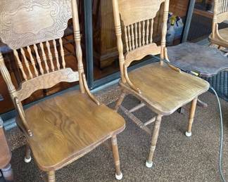 Set of 4 Vintage Oak PressedBack Dining Chairs with Ornate VictorianStyle Designs
