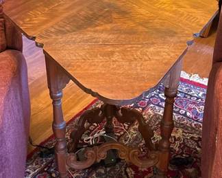 Vintage DropLeaf Gateleg Accent Table  Figured Wood Top  Ornate Carved Base