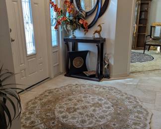 Eye catching swirl mirror, console hall table, animal sculptures, wool rugs