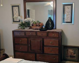 Dresser with mirror, artwork