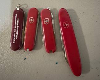 Collection of Four Victorinox Swiss Army Knives