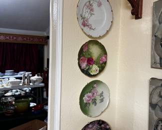 Collection of Four Decorative Porcelain Floral Plates