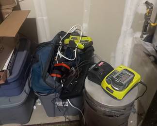 Ryobi 18V lithium-ion cordless tool setup. Includes a Ryobi cordless circular saw, a rapid battery charging station, a high-capacity 18V lithium battery pack, and a heavy-duty padded Ryobi canvas project bag. Great addition for anyone already on or looking to get into the Ryobi battery system.