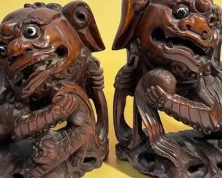 Carved wood foo dogs