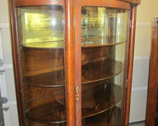 Antique Bowed Glass Cabinet