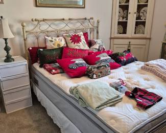 Queen Serta motion bed and Christmas pillows