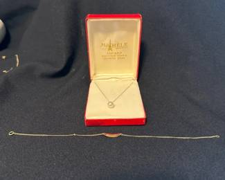 A 14 Karat Gold Bracelet, a 14 Karat Gold Necklace with Cultured Pearl, and a 14 Karat Gold Necklace