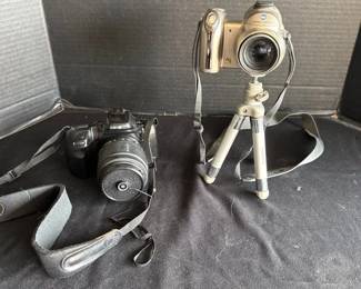 Two Minolta Cameras