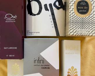 Hundreds of bottles of designer perfume. Many NIB, unopened. Many opened. See pictures.  