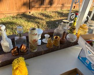 Assorted bottles, decanter, and other items