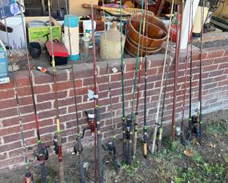 Assorted fishing poles and other fishing accessories