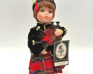 10 Inch Geppeddo Porcelain Doll with 3 12 Inch Metal Doll Stand
