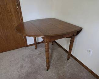 Oak DropLeaf Dining Table with Turned Legs  Casters