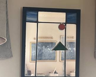 Wall mirror with stained glass inserts