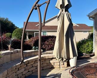 Large outdoor curved arm cantilever patio umbrella (does need new fabric) 