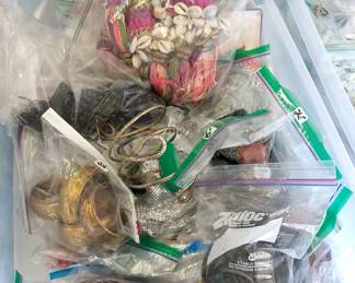 Lots of tubs of jewlery