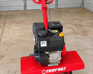Red TroyBilt Tiller in Garage