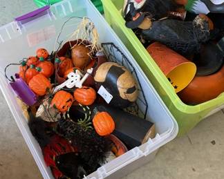 Halloween decor: witch hats, pumpkins, black cats, skulls, and more.
