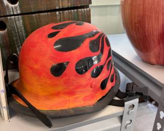Flame-painted motorcycle helmet.