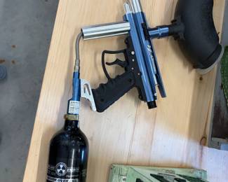 Paintball marker with air tank.