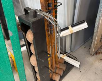 Fireplace log holder and tool set.