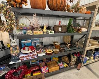 Shelves of holiday decor, games, and gifts.