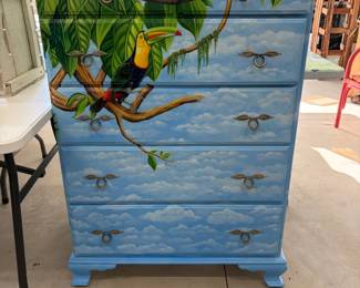 Hand-painted dresser with tropical toucan scene.