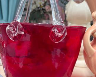 Red art glass basket.