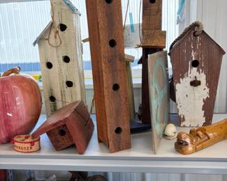 Rustic birdhouses.