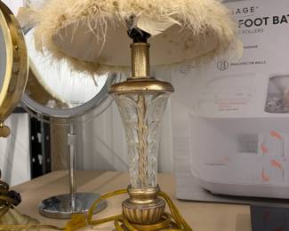 Feather shade lamp and vanity mirror.