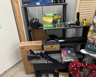 Garage and utility items: first aid kit, flashlight, and more.